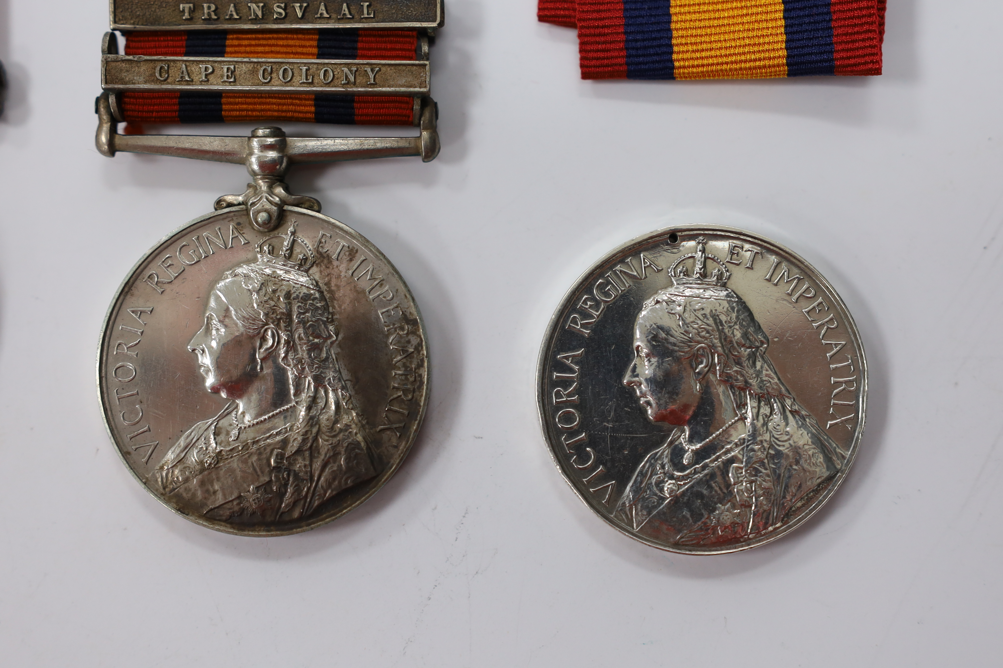 Three Queen's South Africa Medals; Trans & CC to 493 Tpr. T.R.Keegan, W.Prov.M.R.; part erased to 642 Pte E.Boyce Quuenstown Rifle Vol and disc only with Trans and OFS to 2234 Pte J.Martin4th Batt Highland Lt Infy